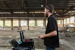 man controlling robot, video shoot